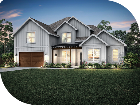 Modern two-story house with gray siding, multiple gables, a wooden double garage door, illuminated windows, and landscaped front yard at dusk.